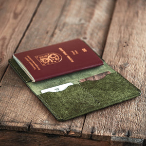 Luava handmade leather passport wallet in pine green open in use