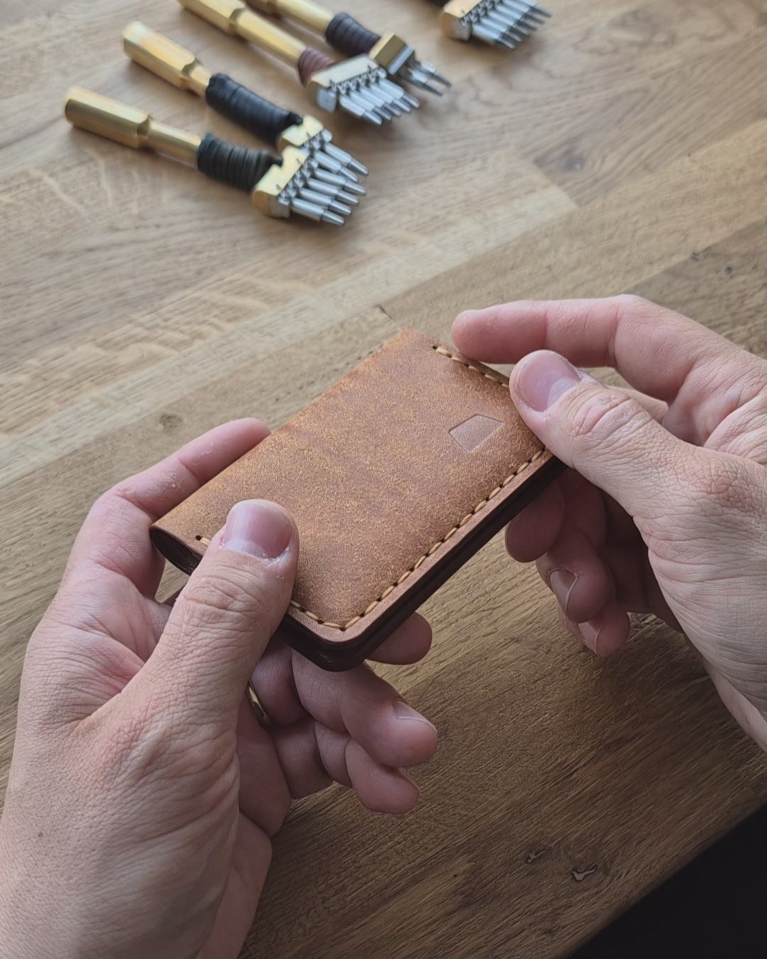 A handmade leather bi-fold wallet for men and women. Handcrafted with vegetable-tanned full-grain leather called Pueblo. Slim wallet for 7 cards and cash.