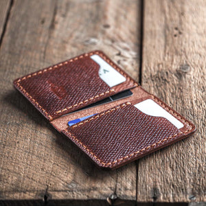 Luava swarm wallet a brown leather bifold wallet in use