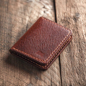Brown Swarm wallet a bifold leather wallet closed