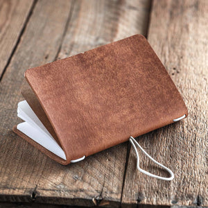 Luava handmade leather journal Ranger Journal color cognac brown. Open. Angle