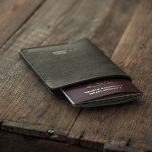 Luava handmade leather passport cover. color pine. front in use