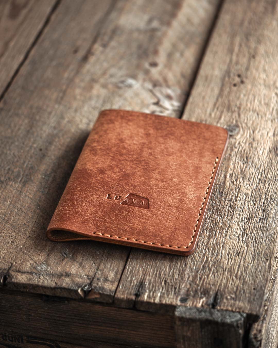 Luava handmade leather passport cover. color cognac. front