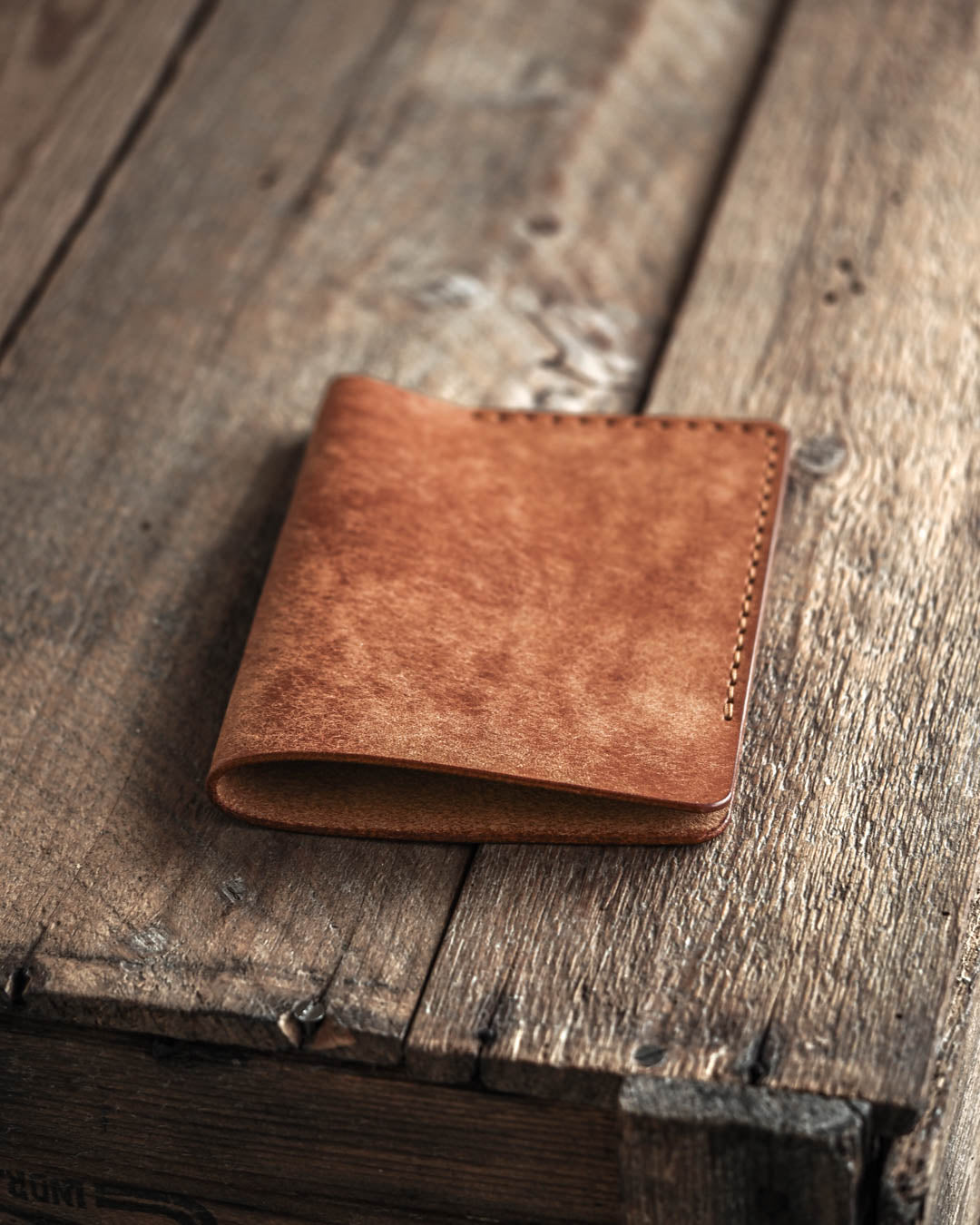 Luava handmade leather passport cover. color cognac. back