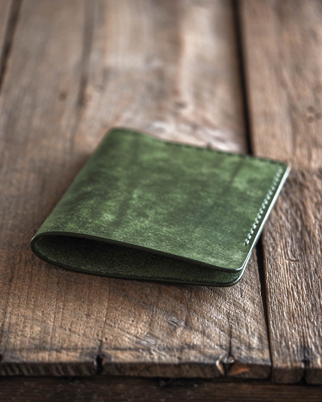 Luava handmade leather passport sleeve cover. color pine. back