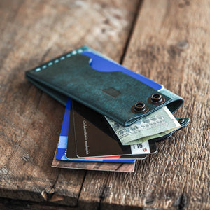 Luava handmade leather wallet Flat in aqua color front in use