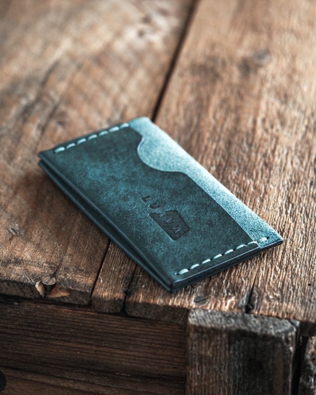 Luava handmade leather wallet Flat in aqua color back
