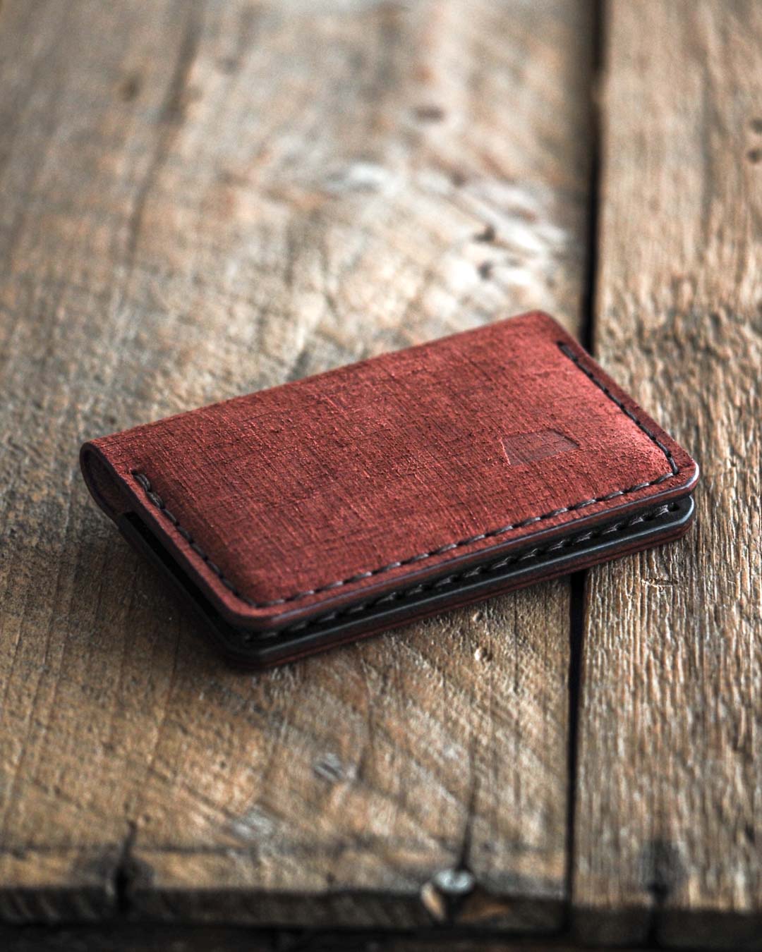 Luava handmade leather bi-fold wallet for men and women. Limited edition Fabric burgundy Journeyman Wallet. front closed