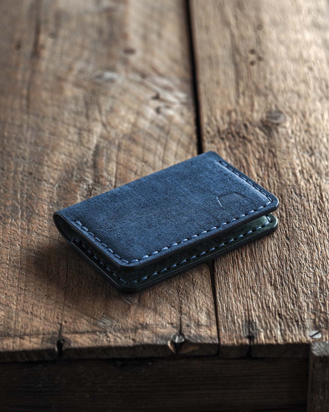 Luava handmade leather bifold wallet for men. Color blue front