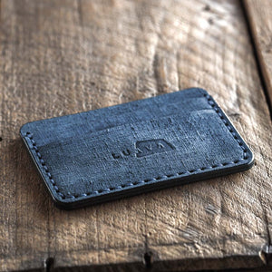Handmade fabric like vegetable tanned full grain leather wallet made with blue leather. Proper wallet front