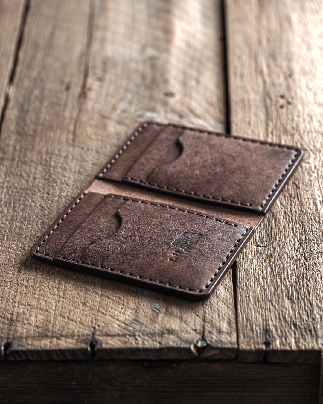 Luava handmade leather bifold wallet for men and women called Ranch Wallet. Color tabacco open