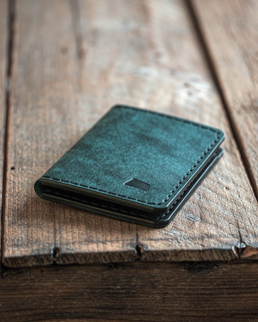 Handmade leather bi-fold wallet blaqua