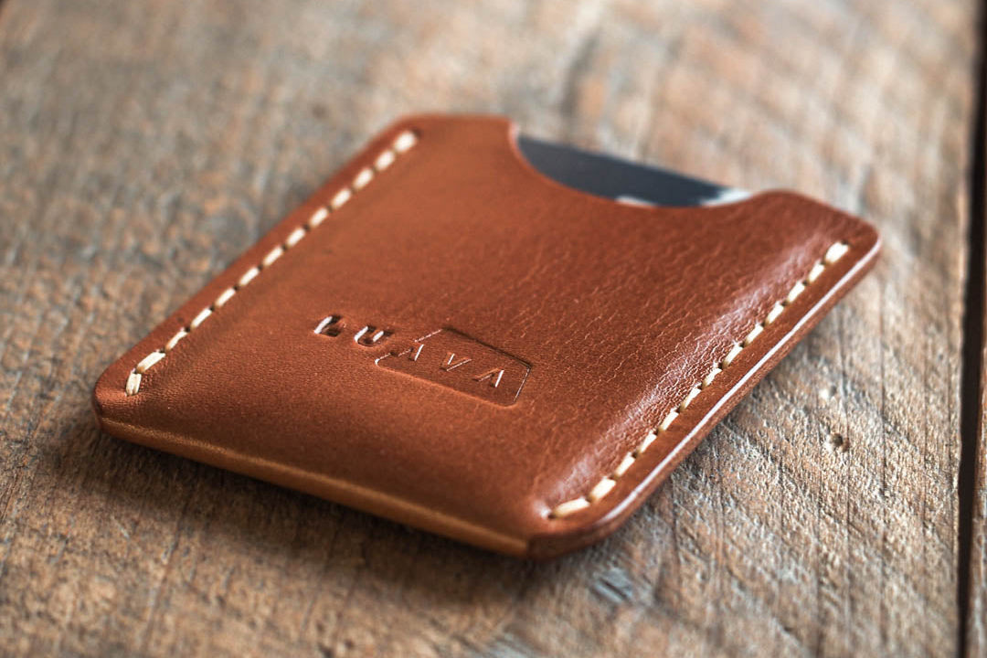 Handmade minimalist leather wallet for men in color cognac brown