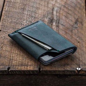 Luava handmade leather wallet handcrafted card holder cardholder made in finland vortex badalassi pueblo aqua front in use