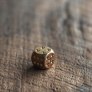 Solid brass dice