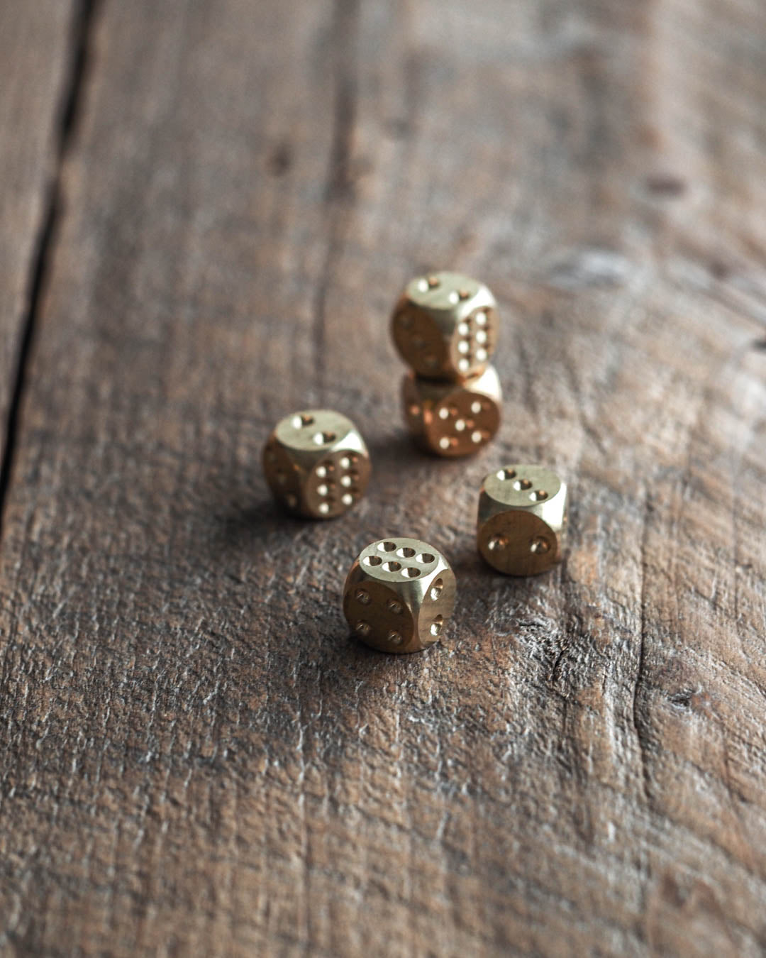 Solid brass dice set of 5