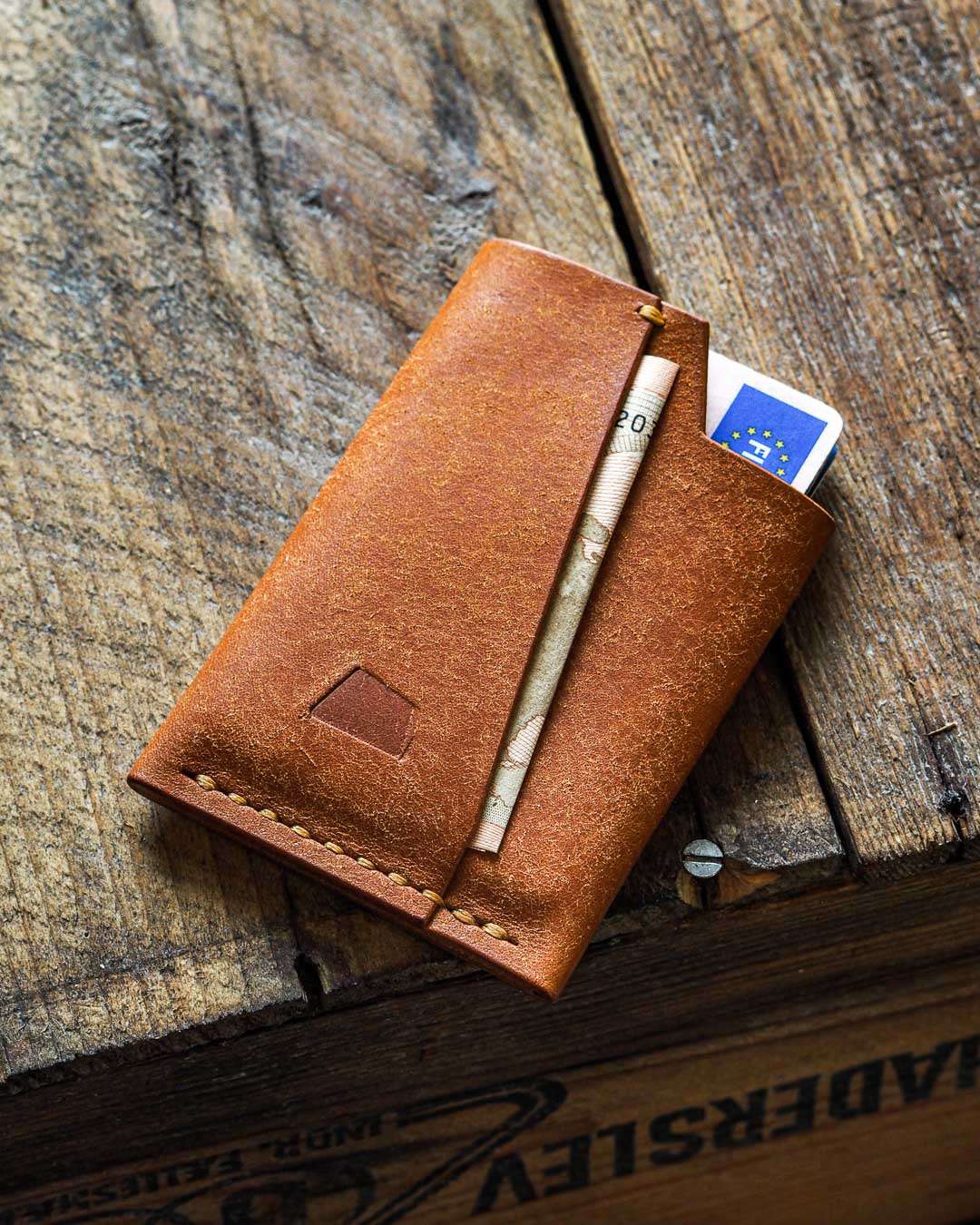 Luava handmade leather wallet handcrafted card holder cardholder made in finland vortex badalassi pueblo cognac front in use