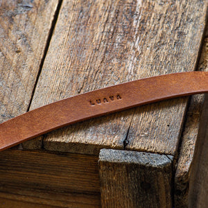 Luava handcrafted leather camera strap wide neckpad pueblo cognac detail logo
