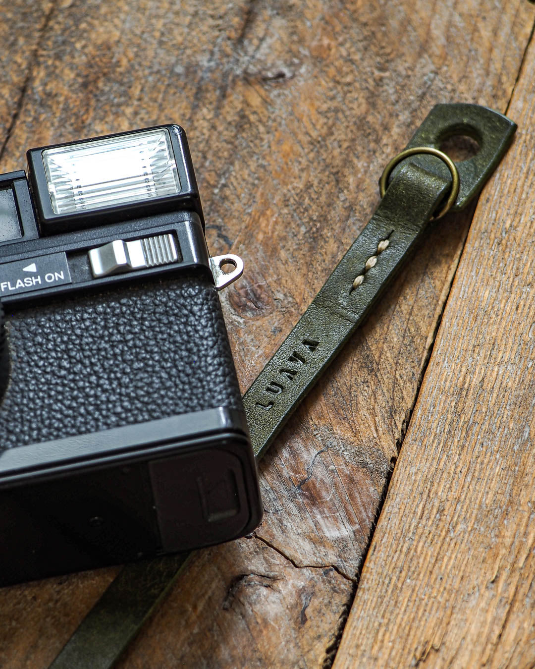 Luava handcrafted leather camera strap adjustable slim pueblo olive detail logo